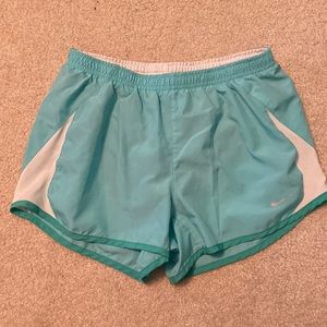 Small women’s nike shorts, color light blue
